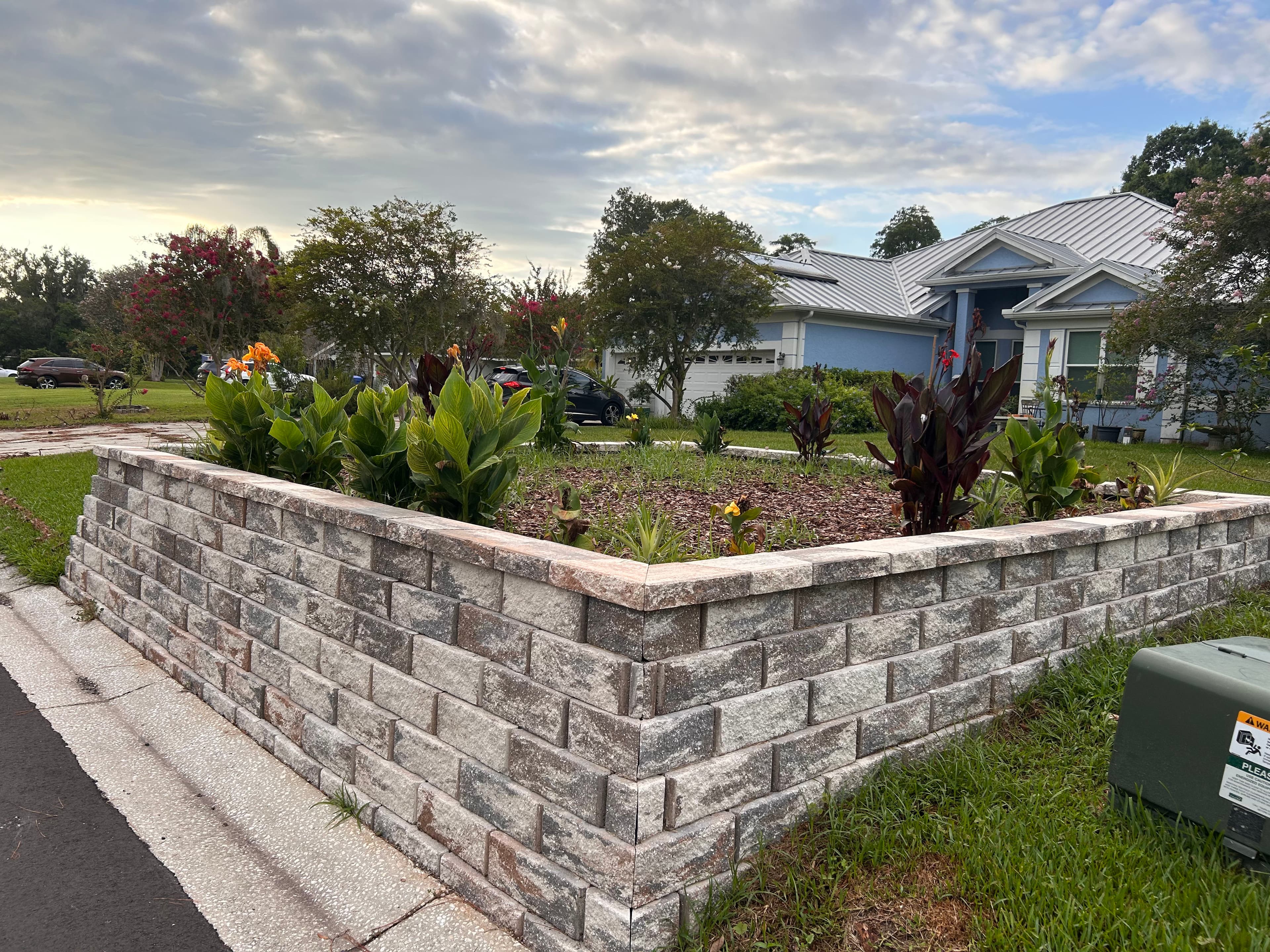Project Stone Retaining Wall Garden Bed Built After Storm Damage image
