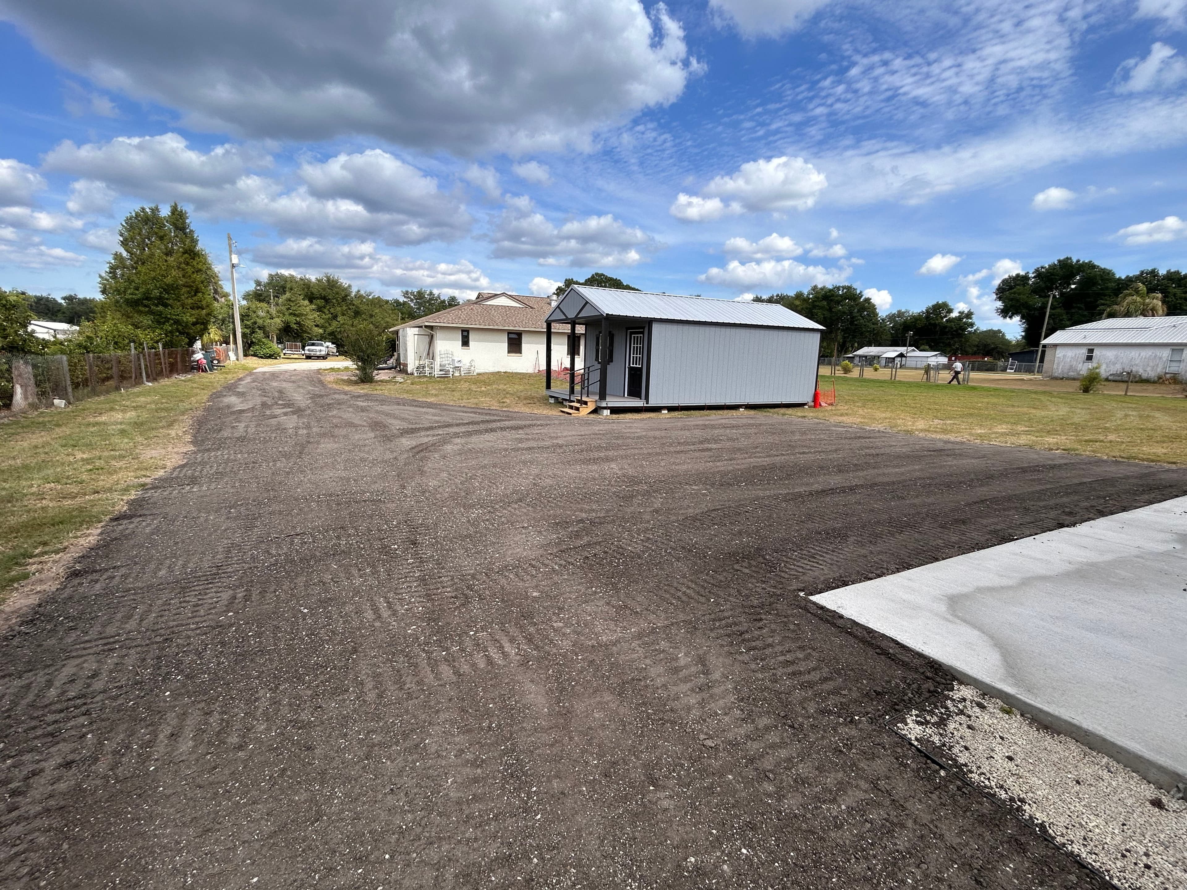 Project Driveway and Shop Apron Graded and Finished with Asphalt Millings image