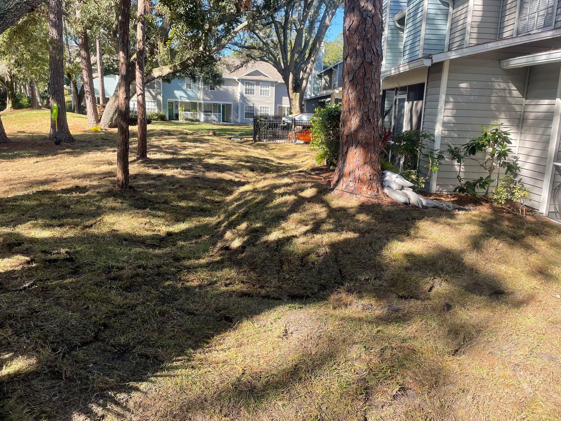 Backyard Drainage Swale Fixes Runoff Flooding Near Foundation image