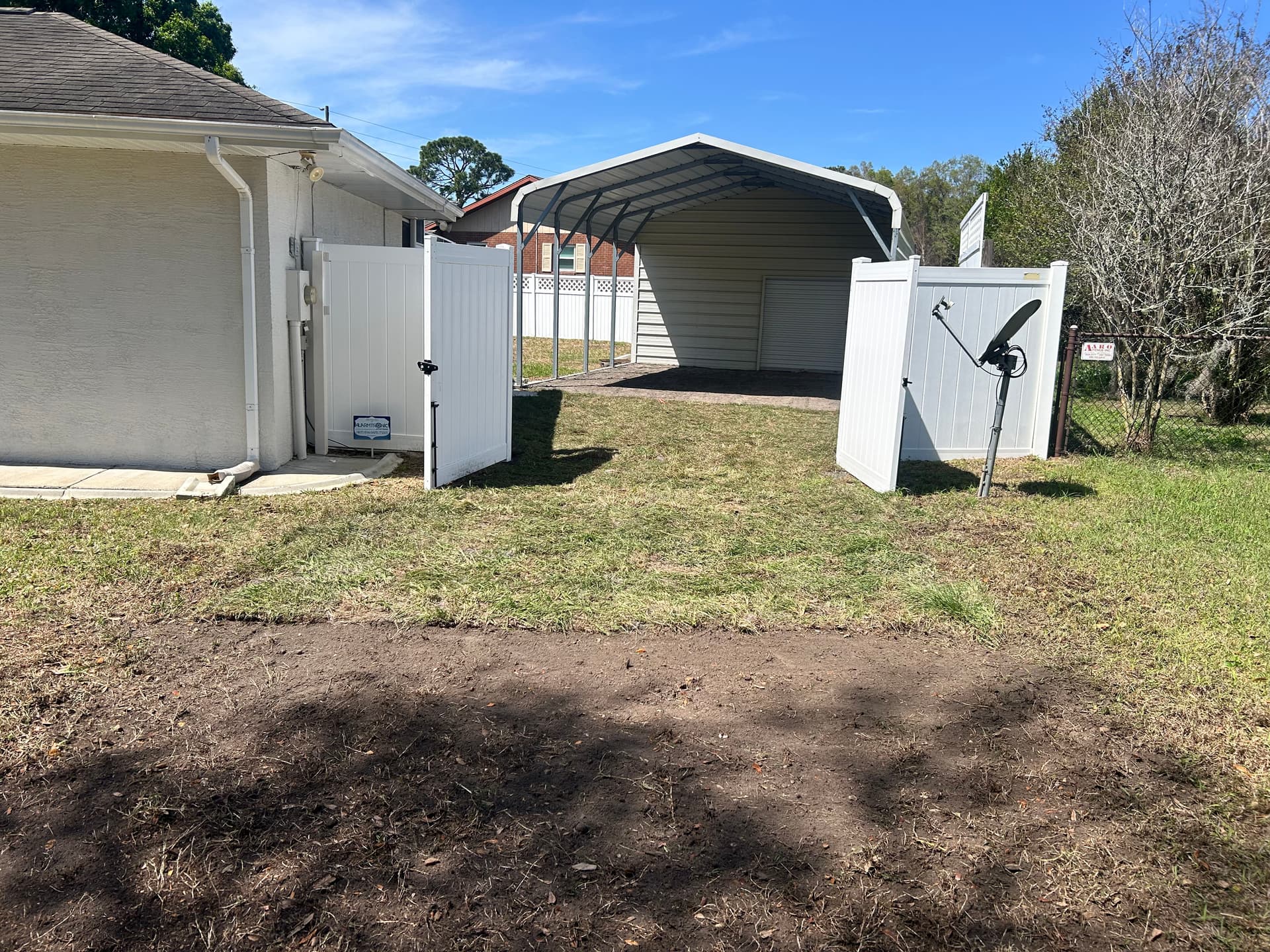 Gallery photos for Carport Grading, Asphalt Millings, and Bahia Sod Backyard Fix: Image #1