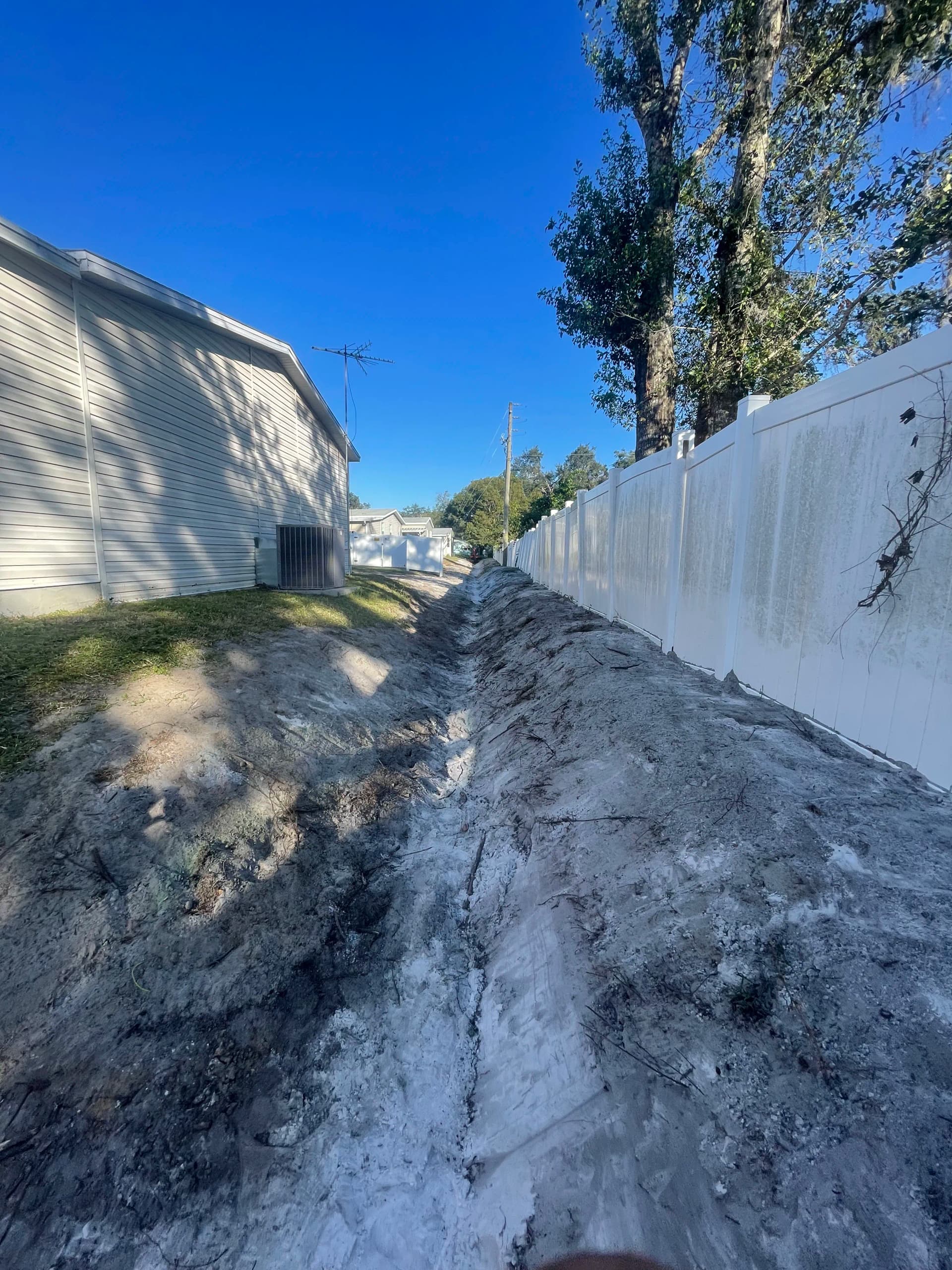 Gallery photos for Drainage Line Restoration and Sod Installation After 30 Years of Washout: Image #5
