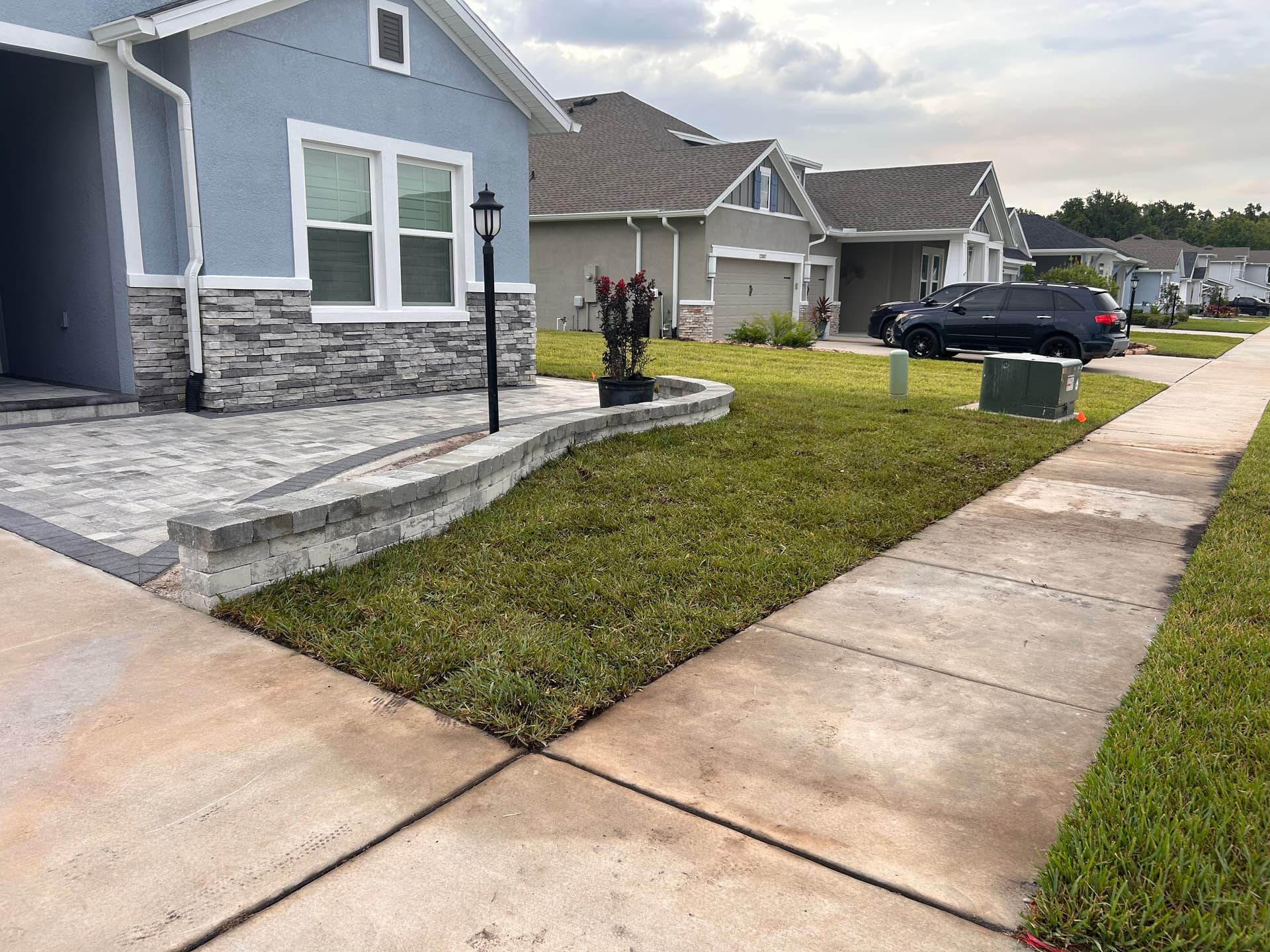 Gallery photos for Drainage Correction and Bahia Sod Install Next to a New Paver Patio: Image #1