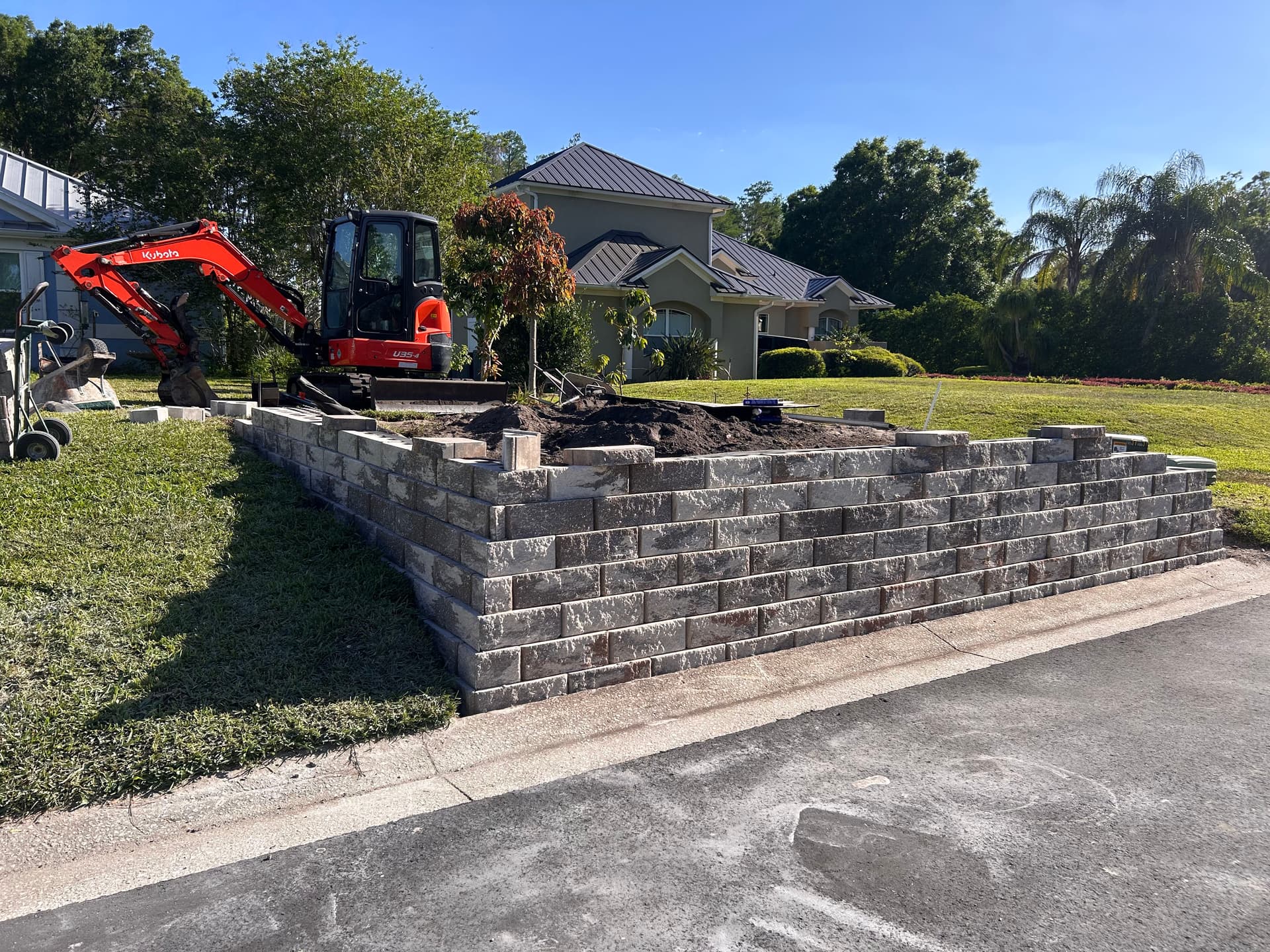 Gallery photos for Stone Retaining Wall Garden Bed Built After Storm Damage: Image #7