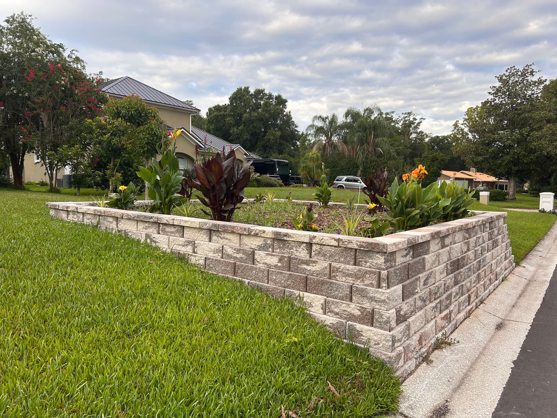 Gallery photos for Stone Retaining Wall Garden Bed Built After Storm Damage: Image #2