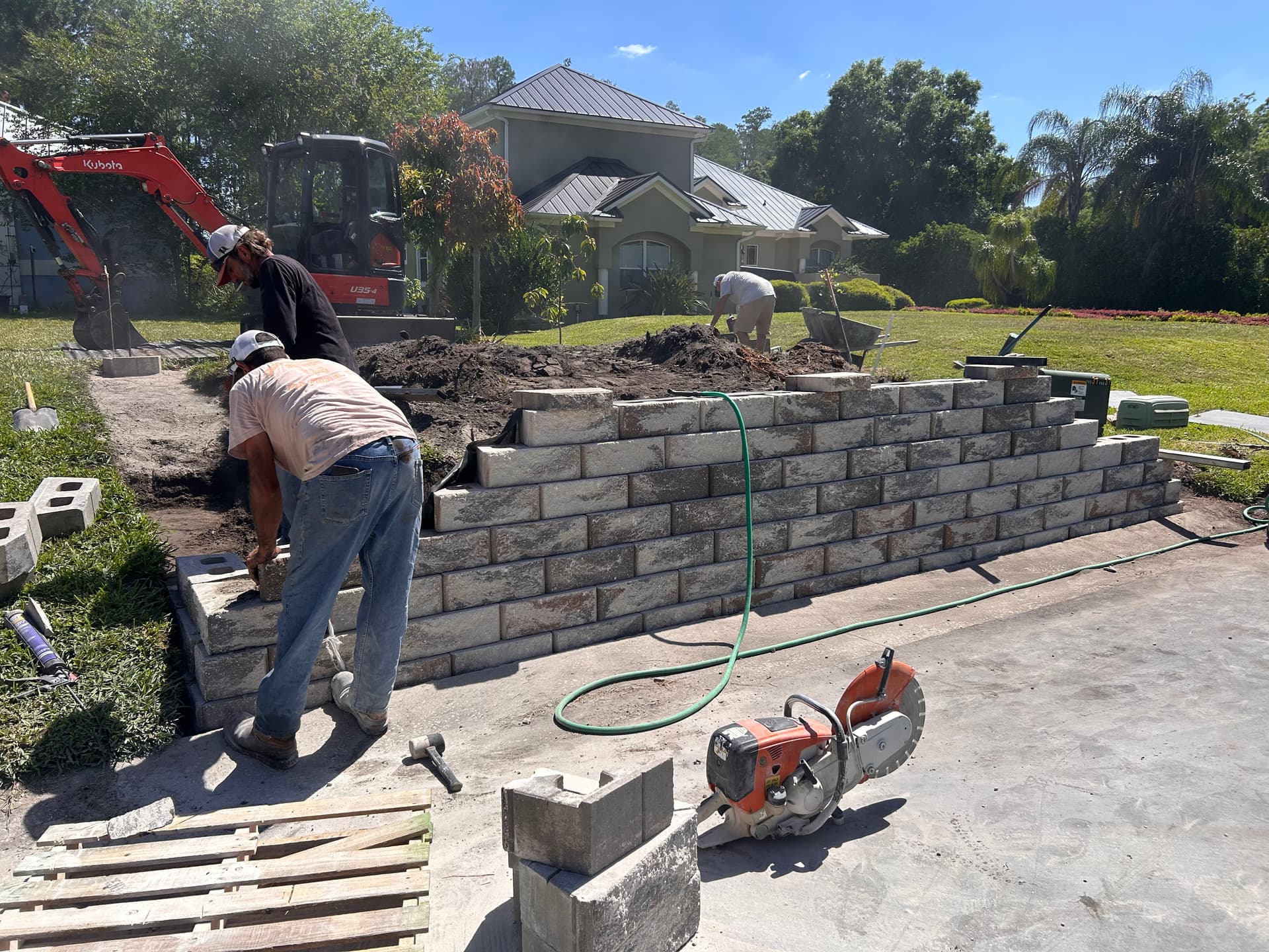 Gallery photos for Stone Retaining Wall Garden Bed Built After Storm Damage: Image #6