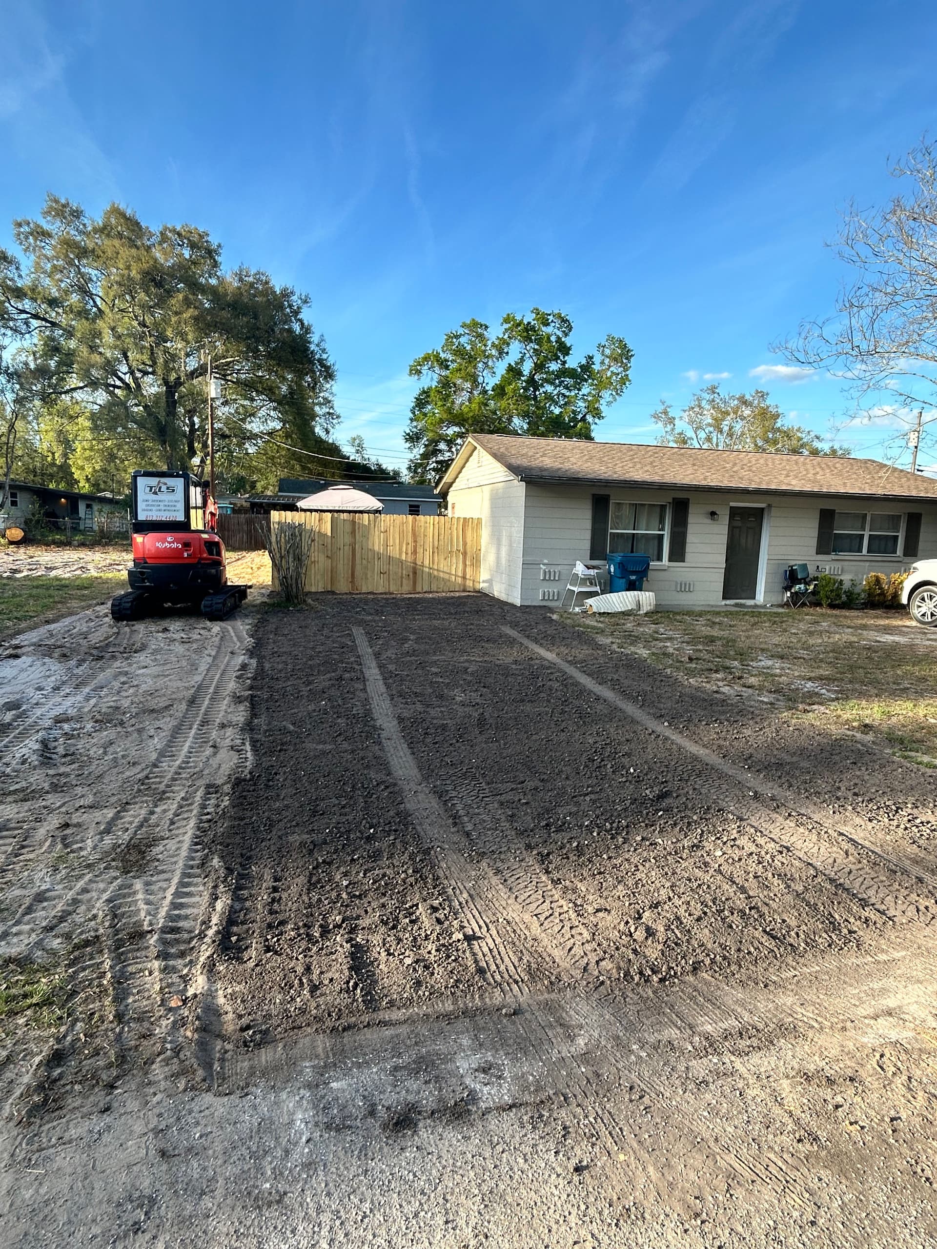 Cracked Concrete Out, Asphalt Millings In - Small Driveway Done Right image
