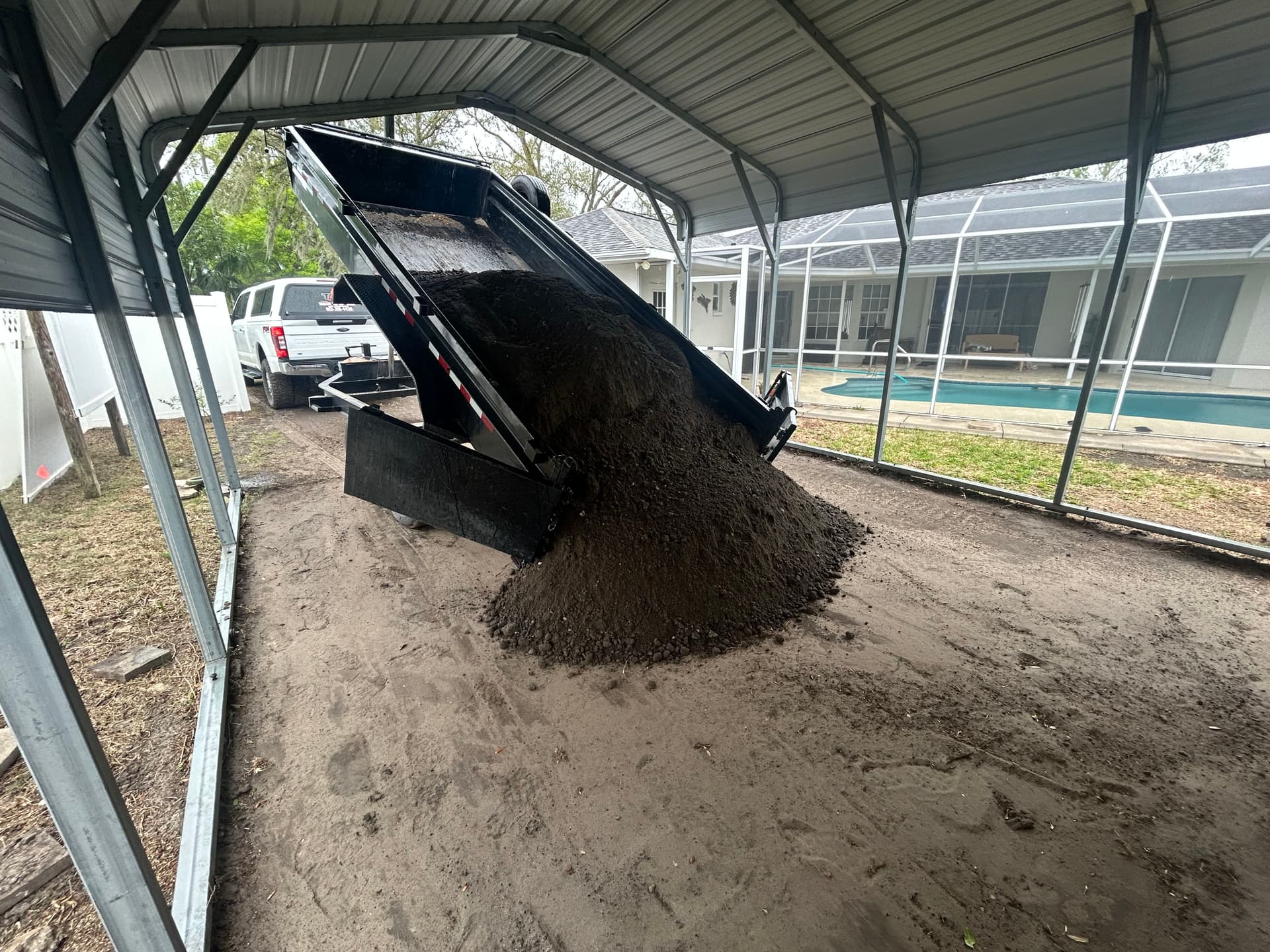 Gallery photos for Carport Grading, Asphalt Millings, and Bahia Sod Backyard Fix: Image #4