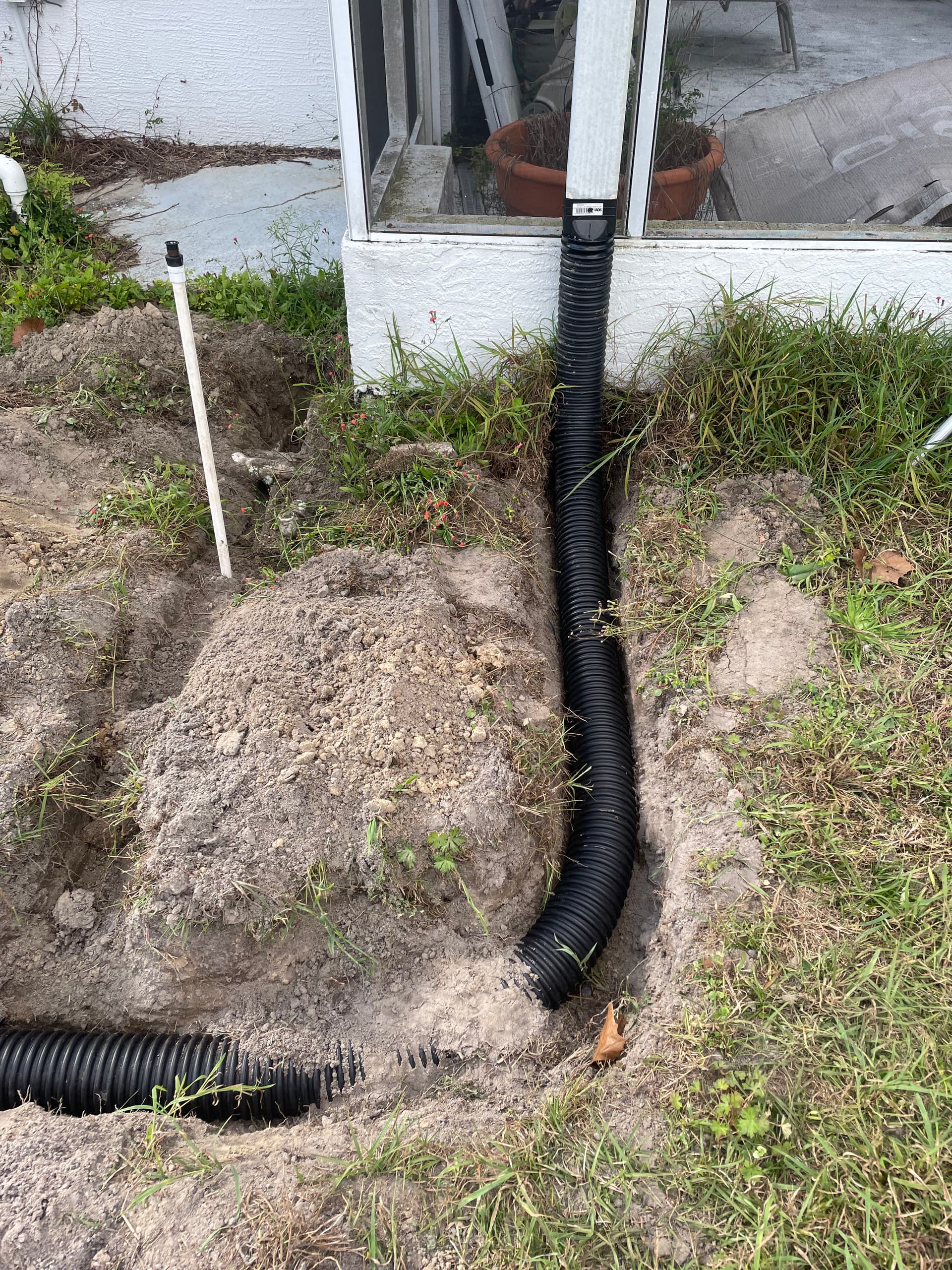 Gallery photos for Downspout Tie-In and Catch Basin Drainage System Install: Image #1