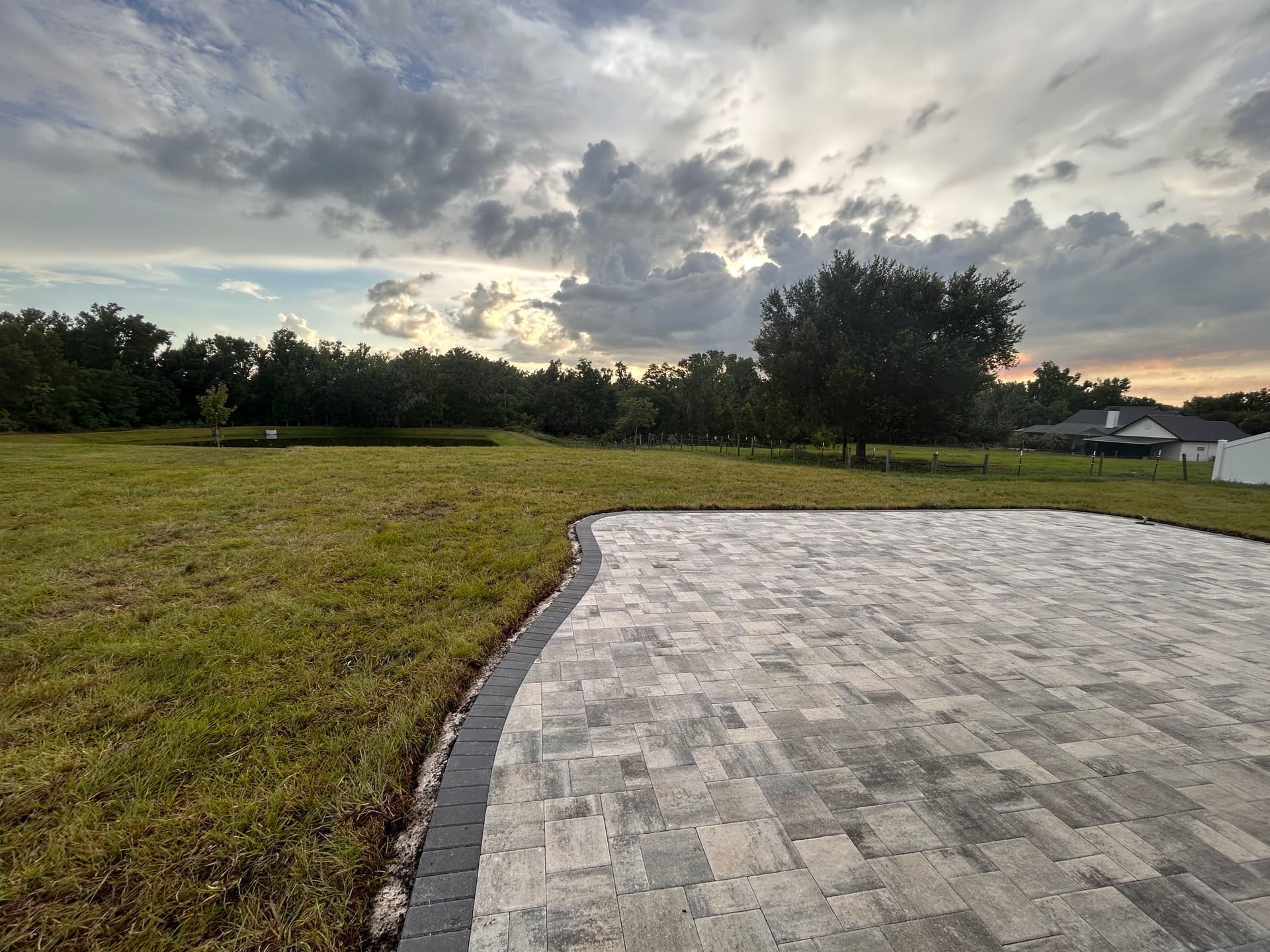 Gallery photos for Drainage Correction and Bahia Sod Install Next to a New Paver Patio: Image #9