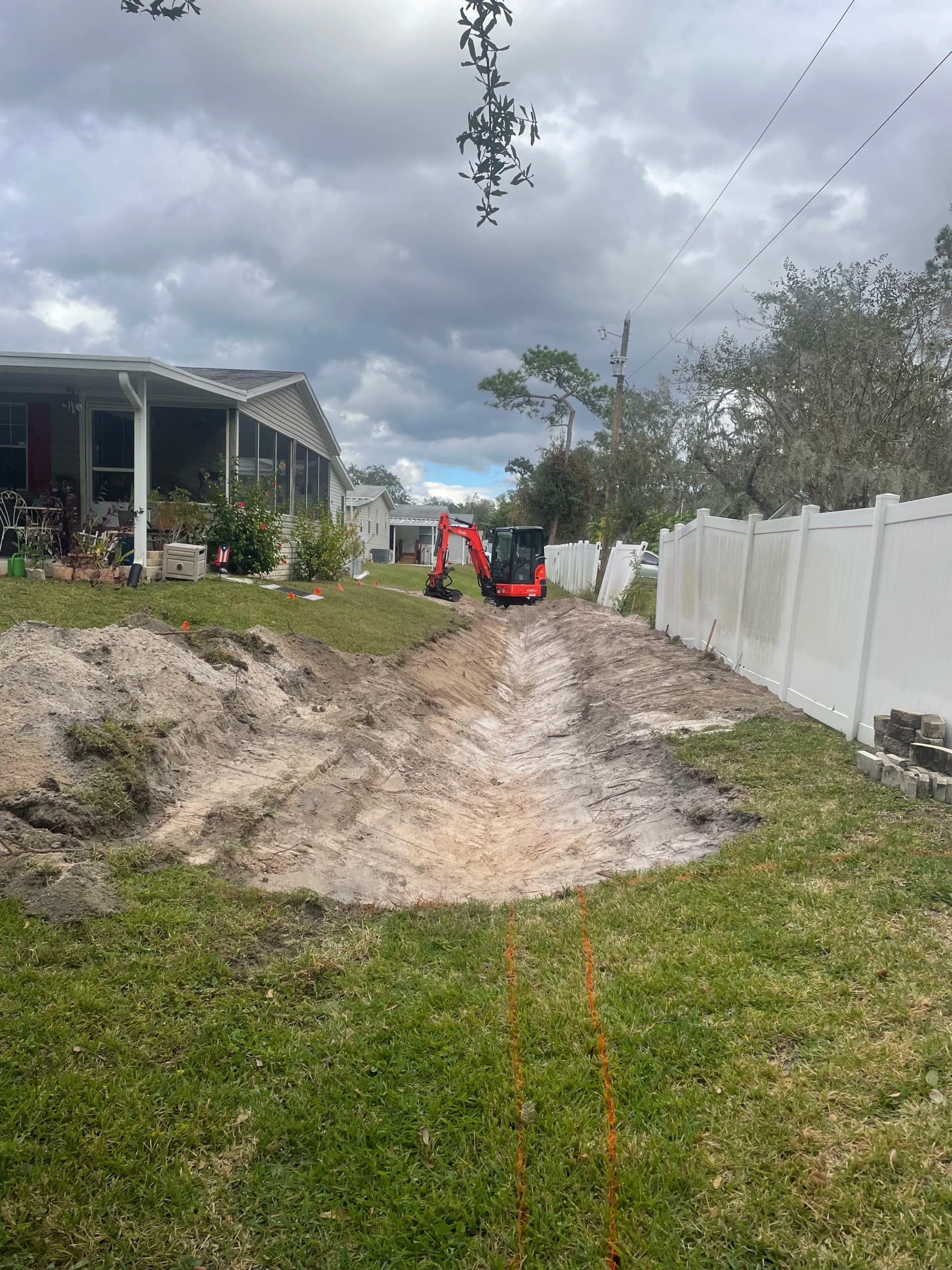 Gallery photos for Drainage Line Restoration and Sod Installation After 30 Years of Washout: Image #3
