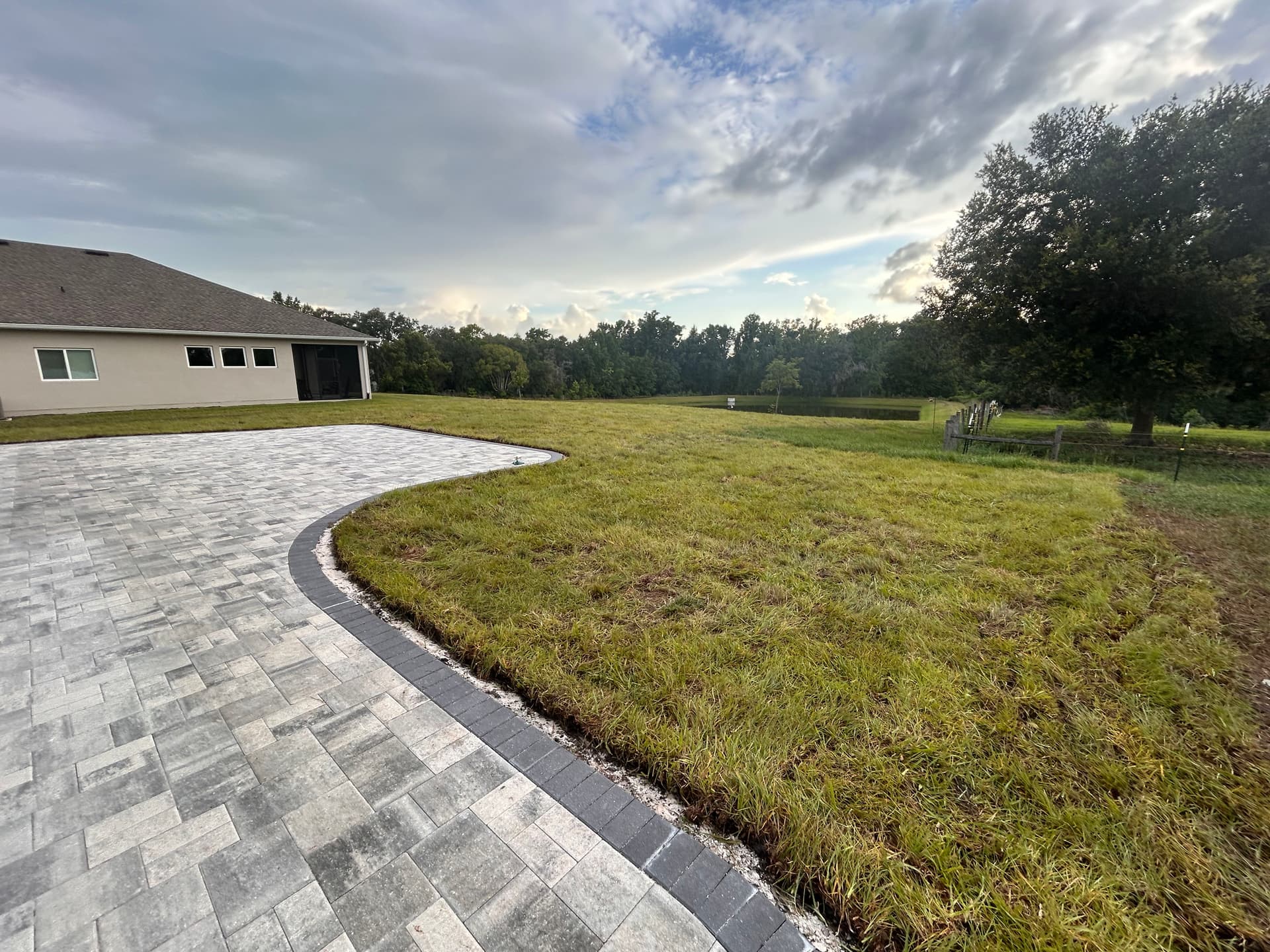 Gallery photos for Drainage Correction and Bahia Sod Install Next to a New Paver Patio: Image #8