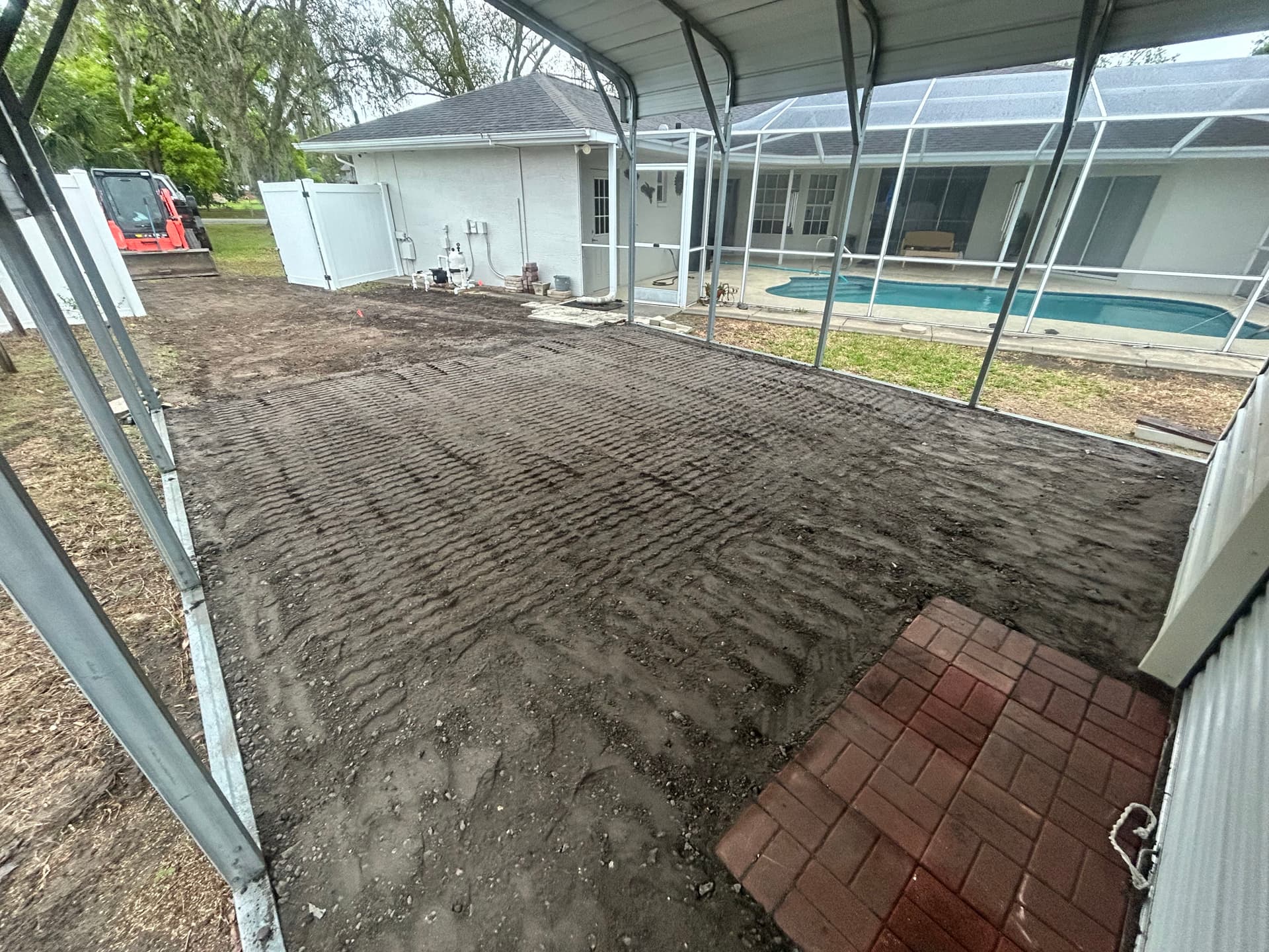 Gallery photos for Carport Grading, Asphalt Millings, and Bahia Sod Backyard Fix: Image #5