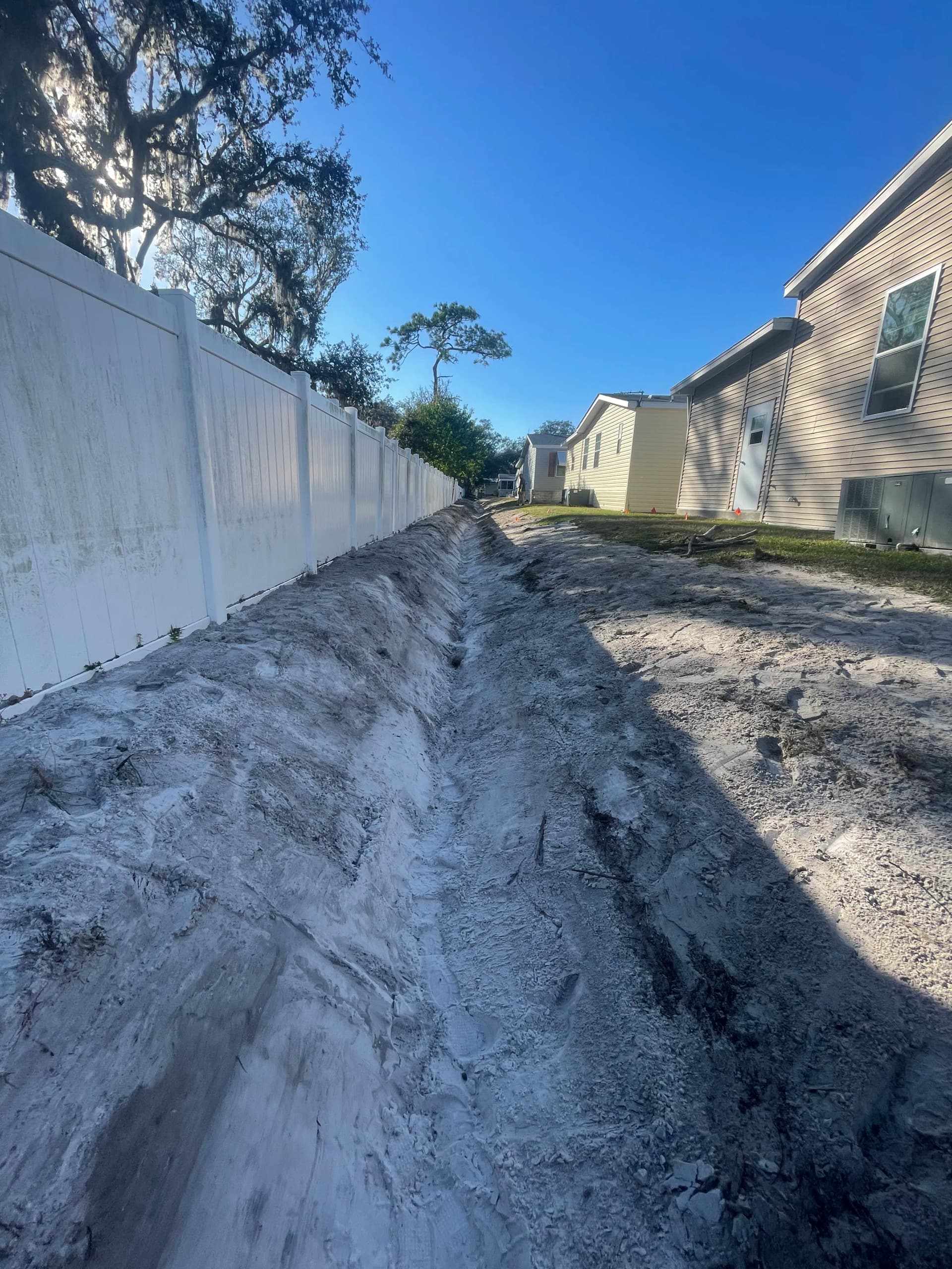 Gallery photos for Drainage Line Restoration and Sod Installation After 30 Years of Washout: Image #4