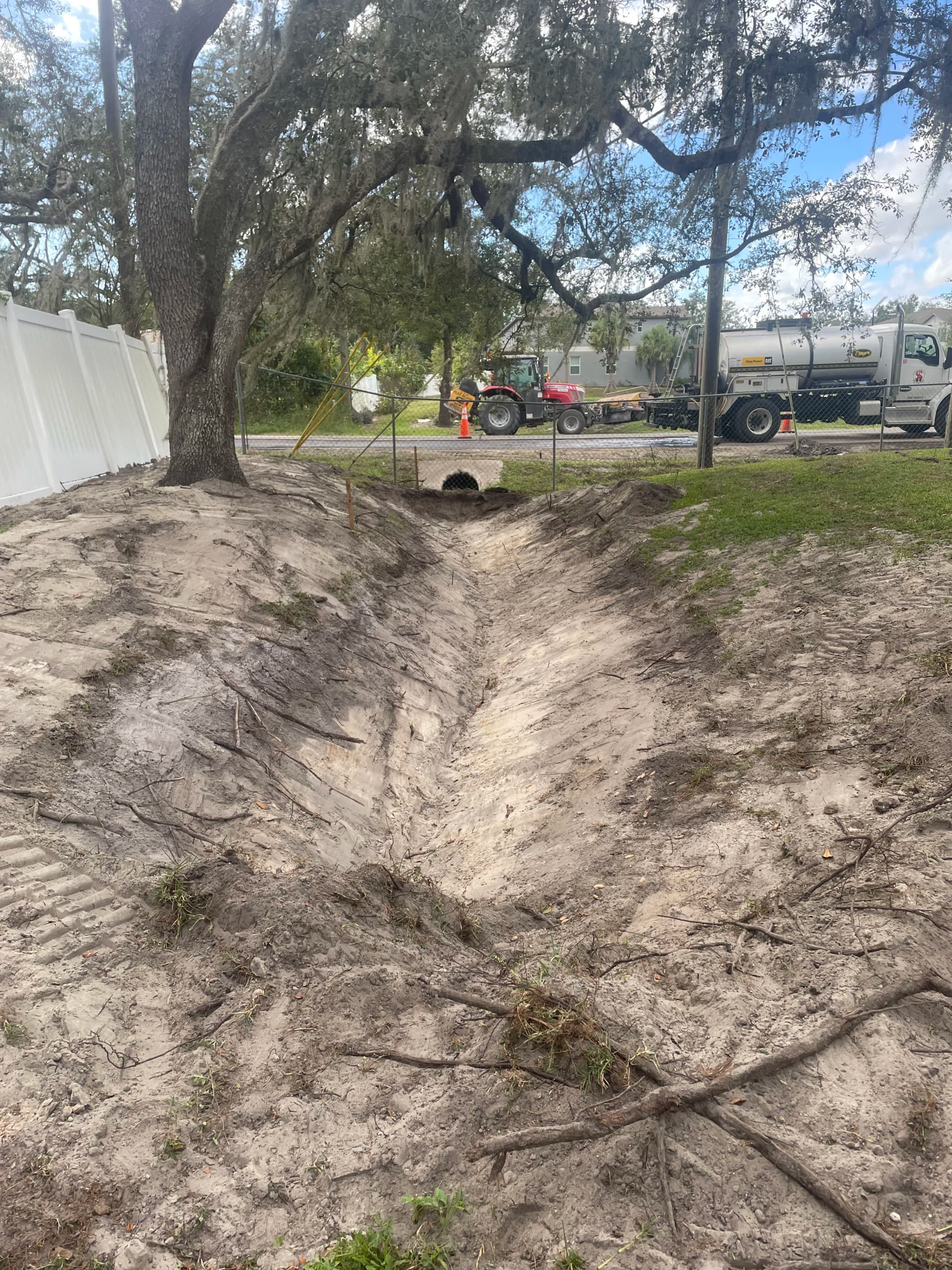 Gallery photos for Drainage Line Restoration and Sod Installation After 30 Years of Washout: Image #2