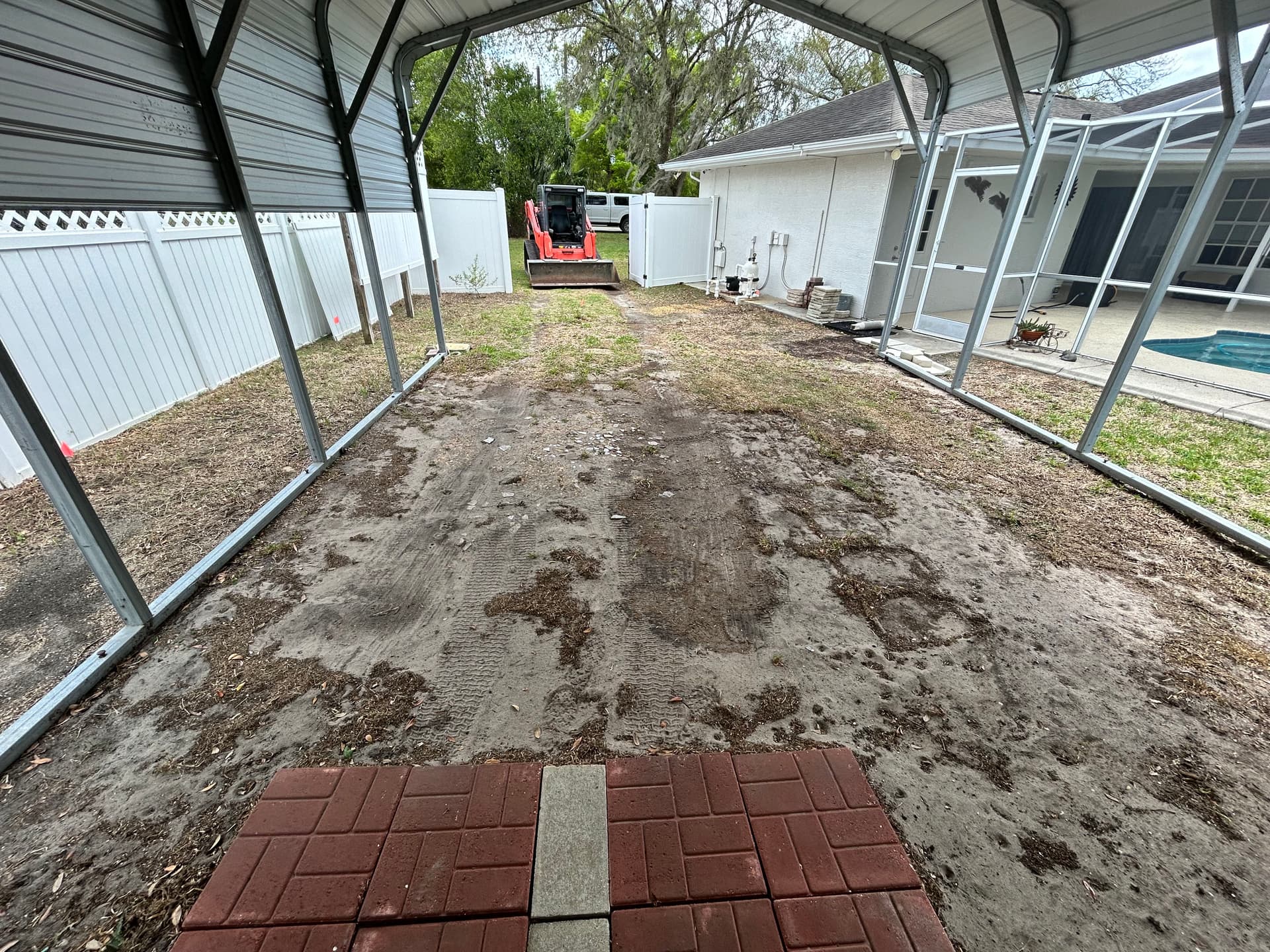Gallery photos for Carport Grading, Asphalt Millings, and Bahia Sod Backyard Fix: Image #2