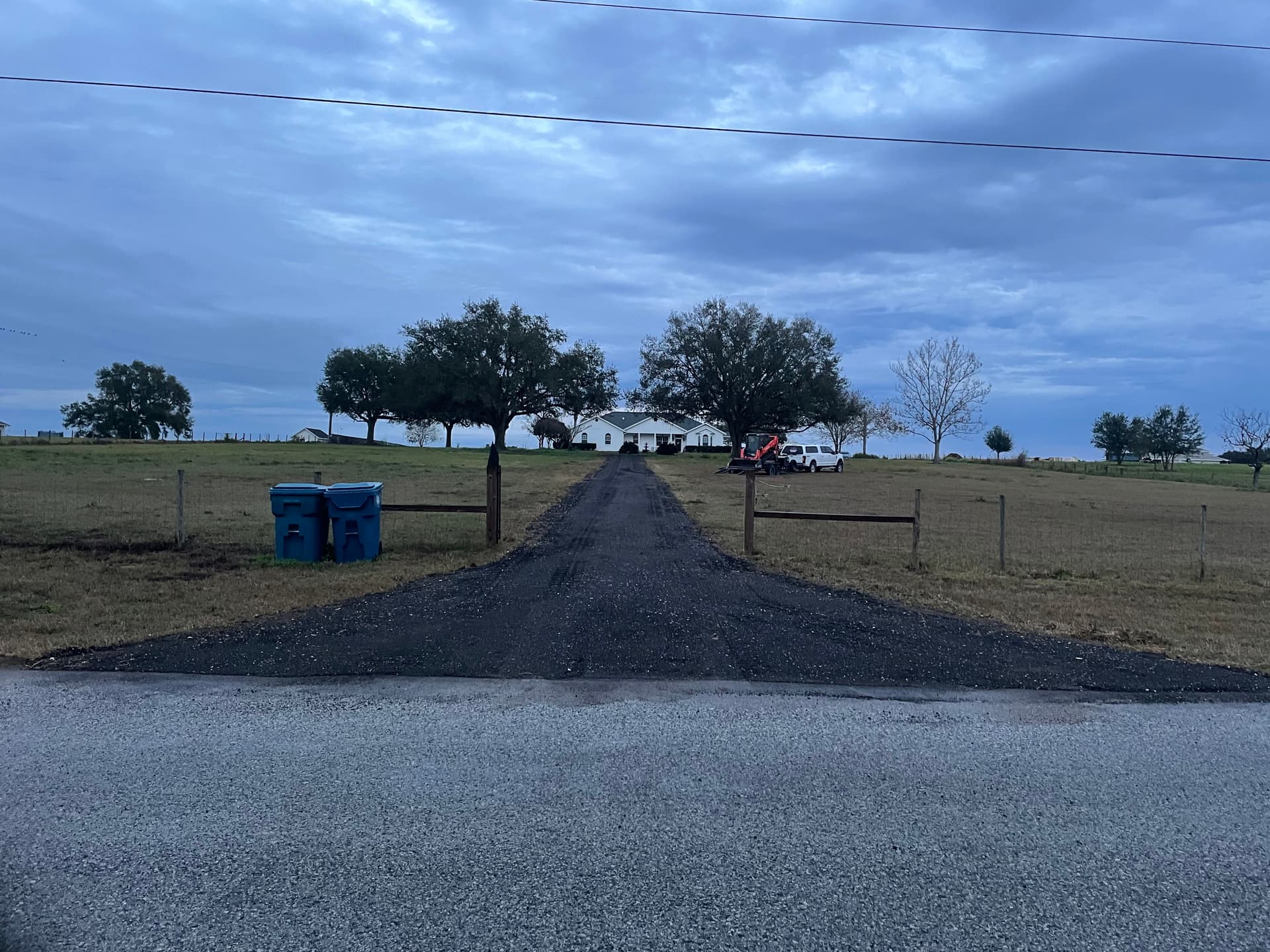 Worn Out Rural Driveway Gets a Full Asphalt Millings Makeover image
