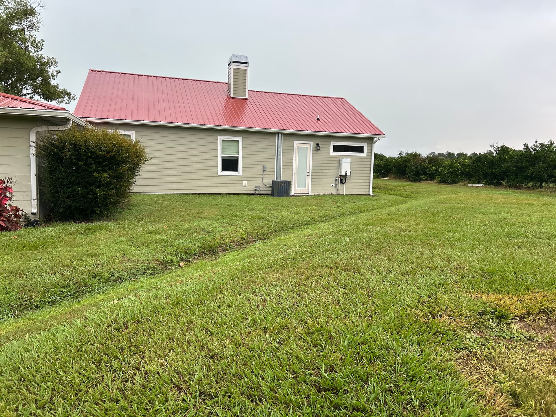 Gallery photos for Final Grade Correction and Drainage Fix After Home Addition: Image #1