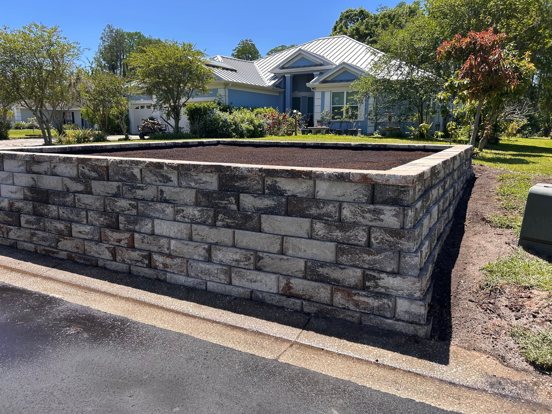 Gallery photos for Stone Retaining Wall Garden Bed Built After Storm Damage: Image #9