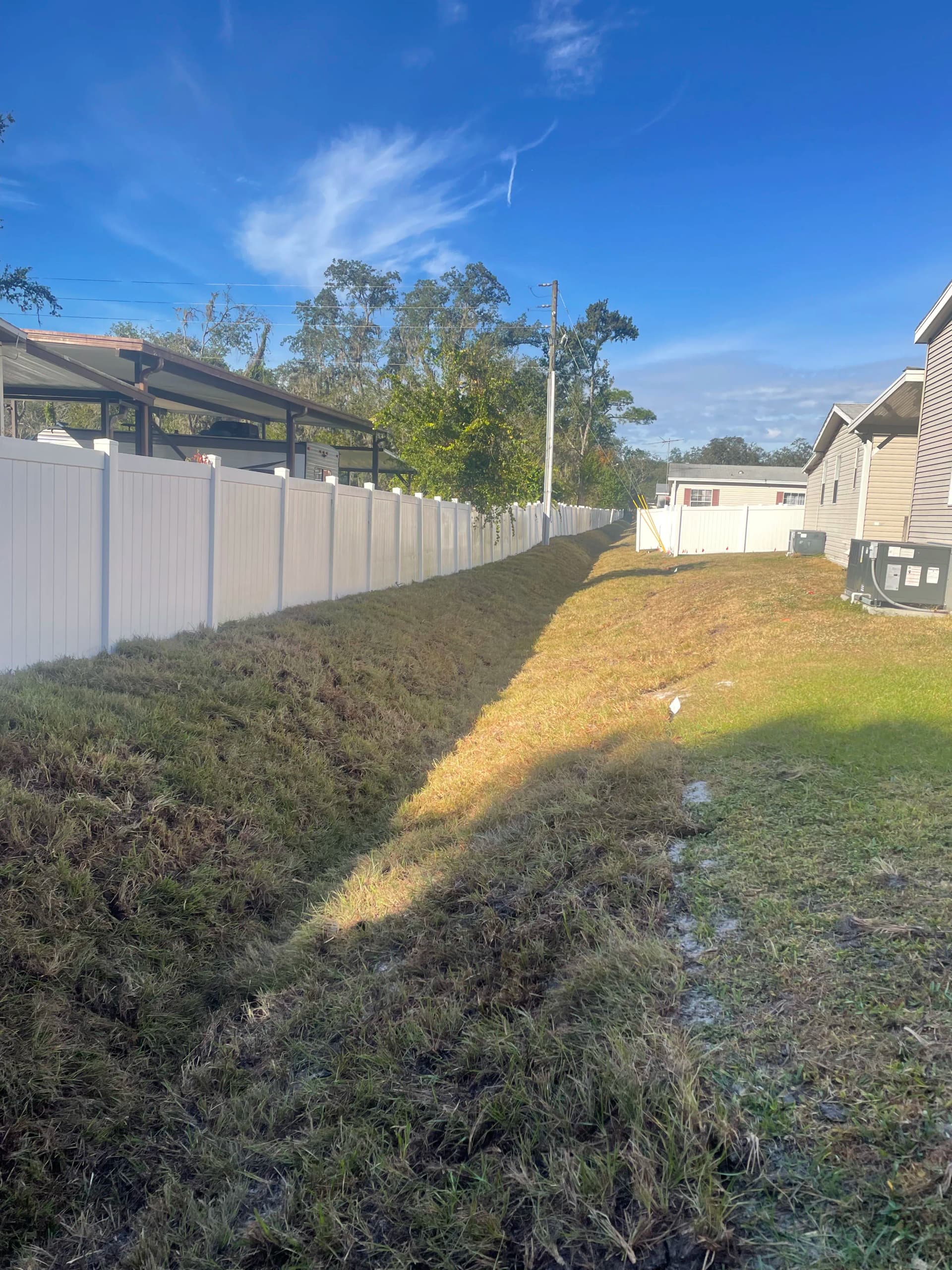 Gallery photos for Drainage Line Restoration and Sod Installation After 30 Years of Washout: Image #9